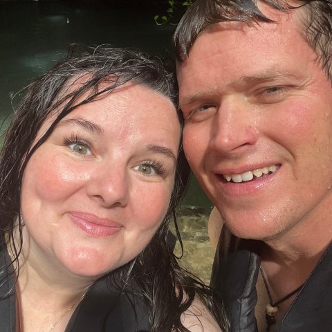 a woman smiling and posing for a photo