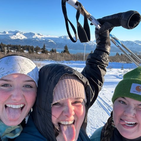 a group of people posing for the camera